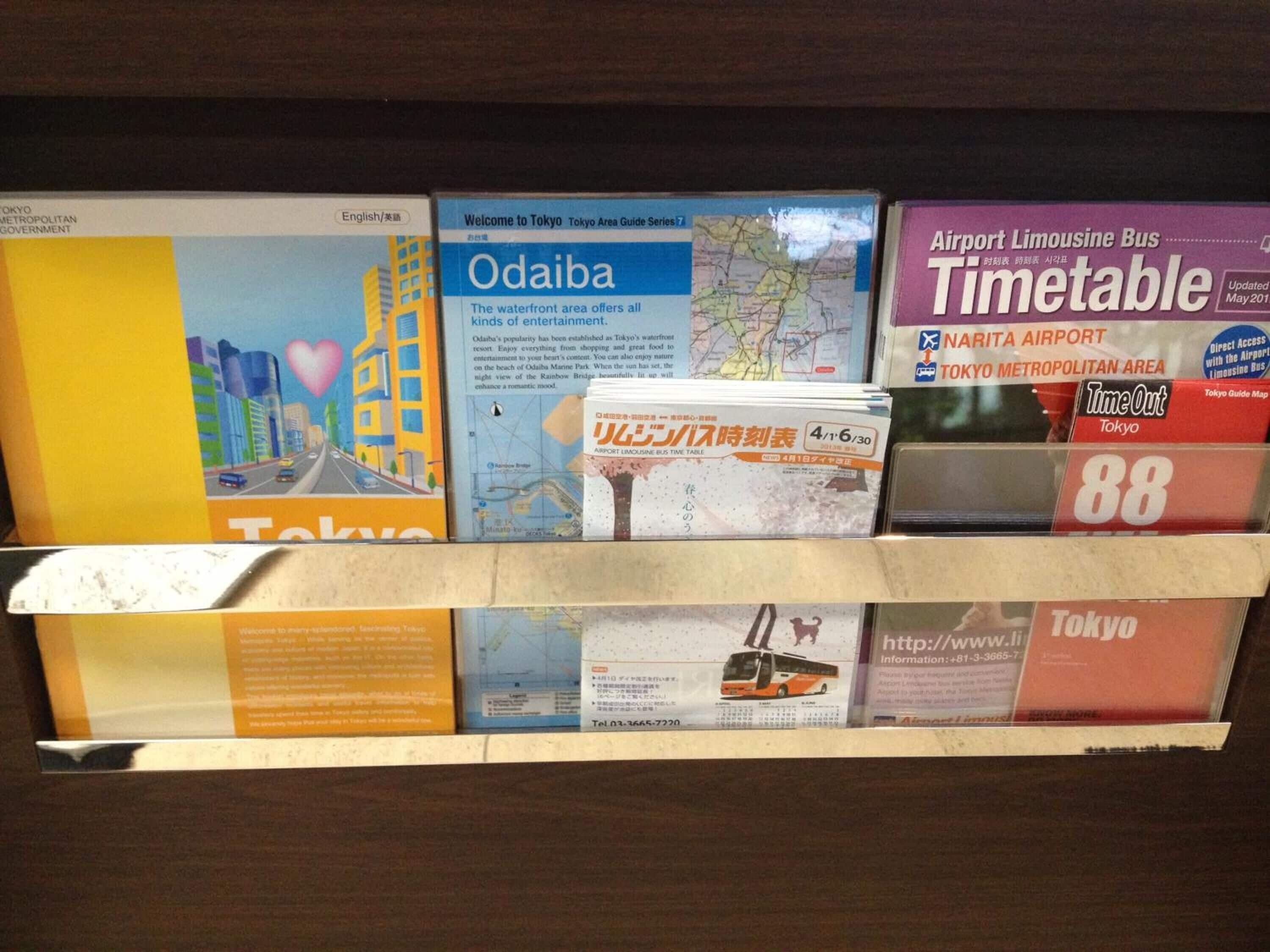 A collection of travel guides and timetables for Tokyo, including a guide to Odaiba and Narita Airport.