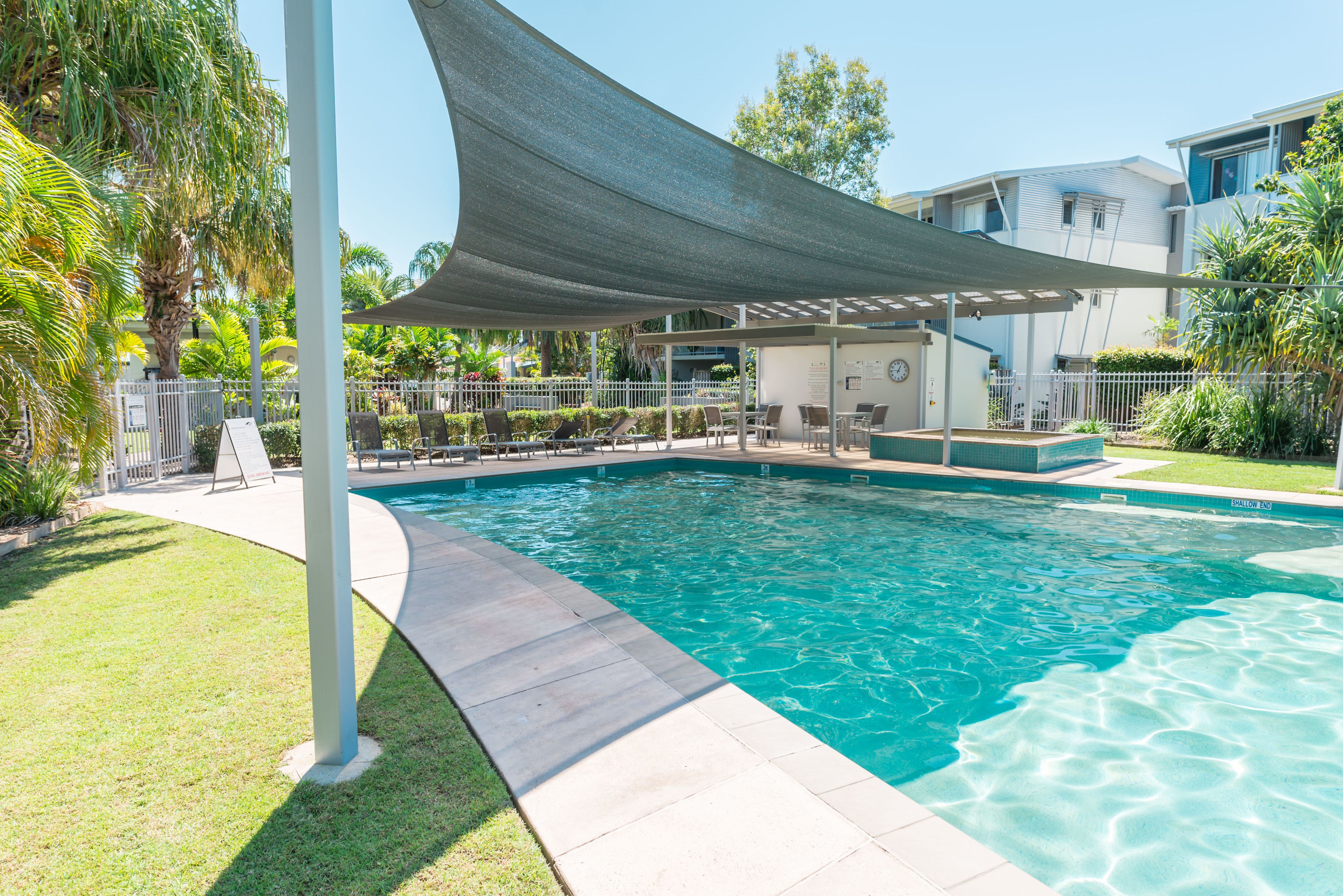 outdoor pool, pool umbrellas, pool loungers