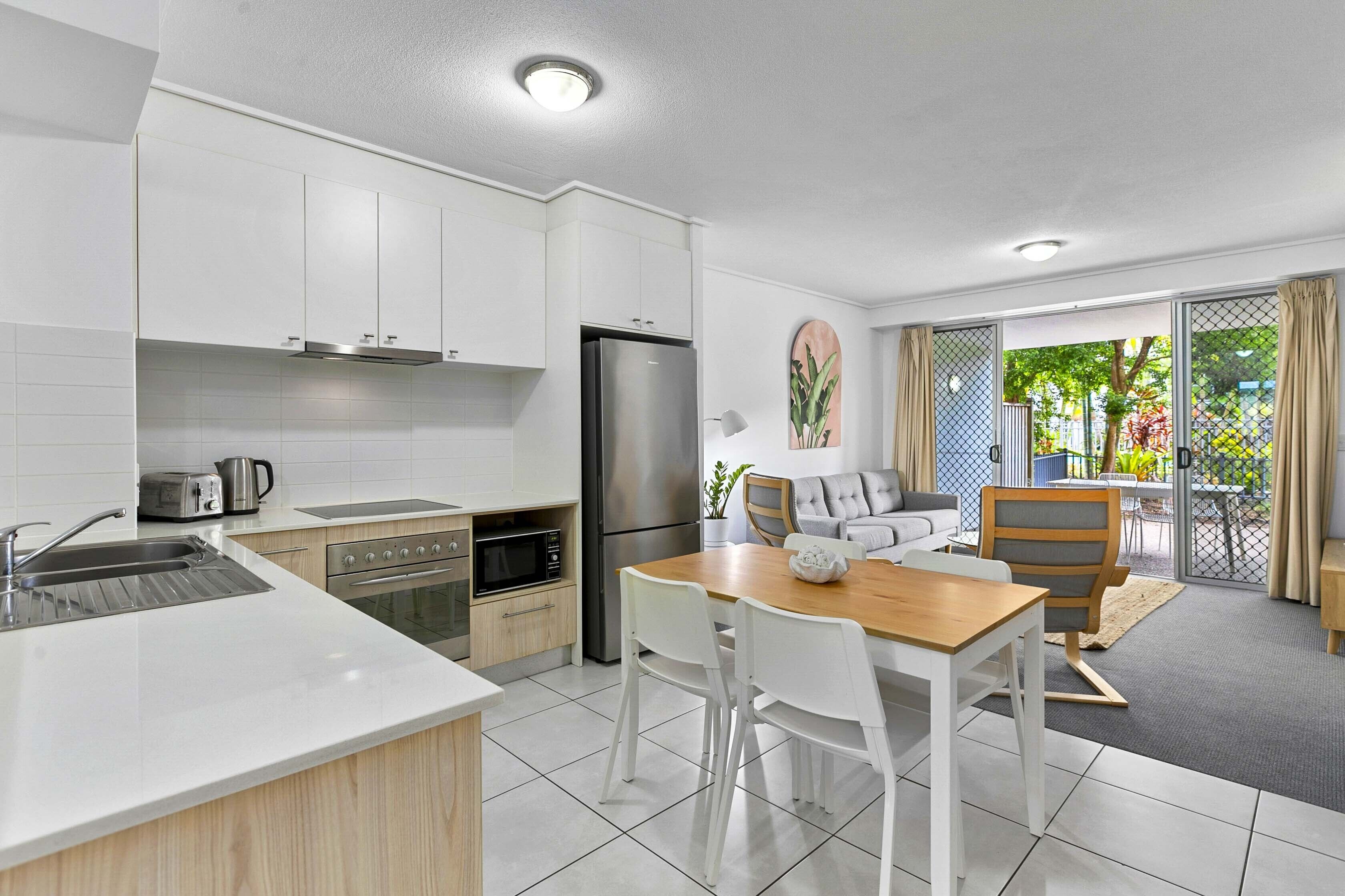 full-sized fridge, microwave, stovetop, dishwasher