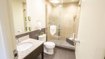 Shower, rainfall showerhead, hair dryer, towels