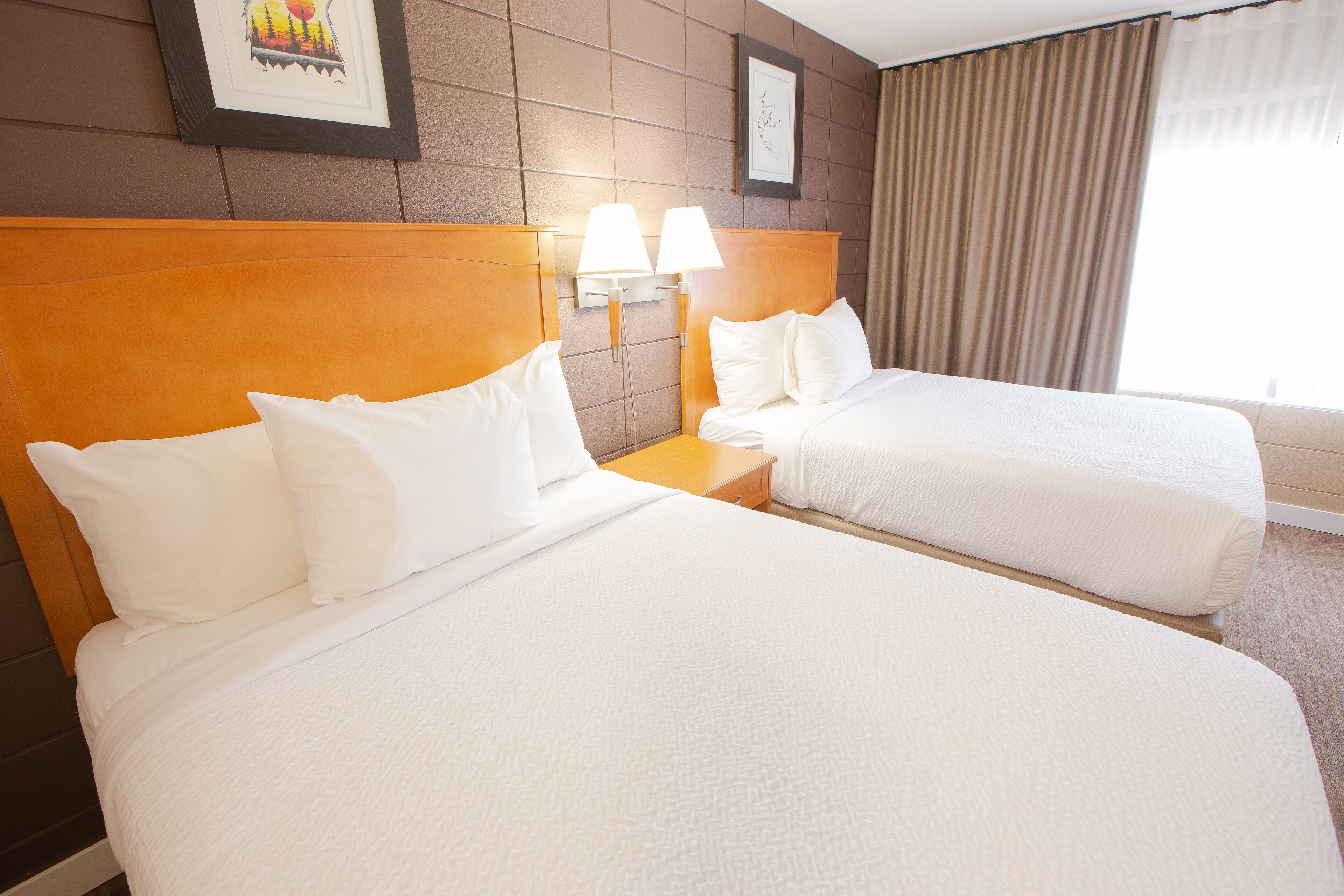 premium bedding, down duvets, pillow-top beds, individually decorated