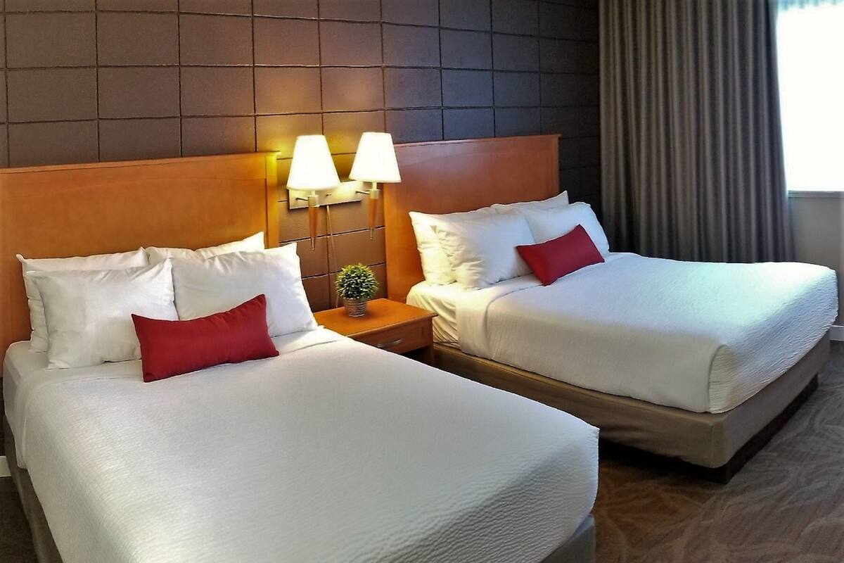 Premium bedding, down comforters, pillowtop beds, blackout drapes