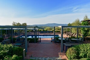 Outdoor pool, pool umbrellas, sun loungers