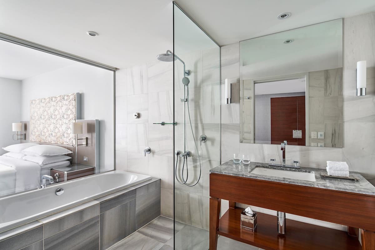 Separate tub and shower, deep soaking tub, rainfall showerhead