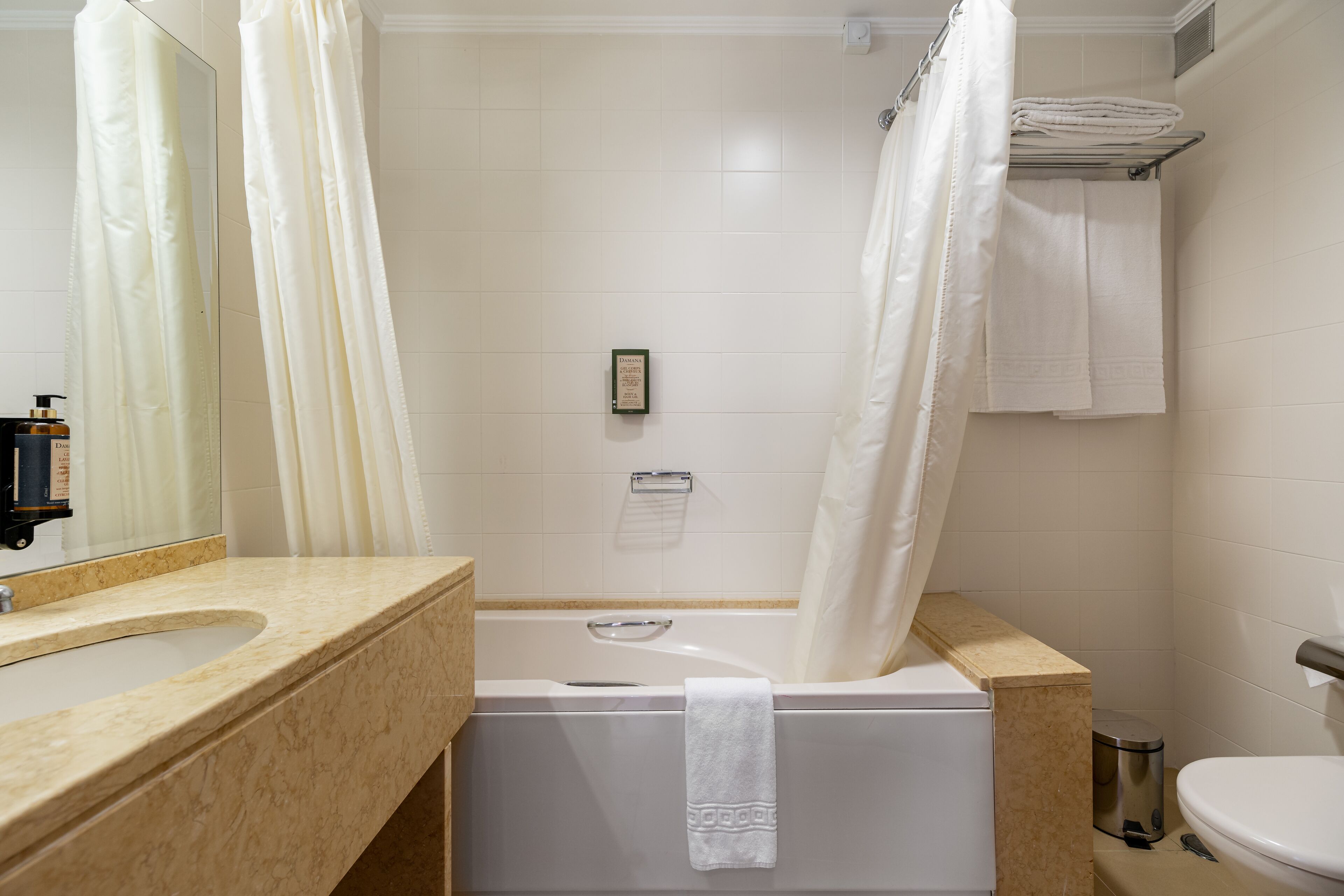 combined shower/bathtub, deep-soaking bathtub, free toiletries