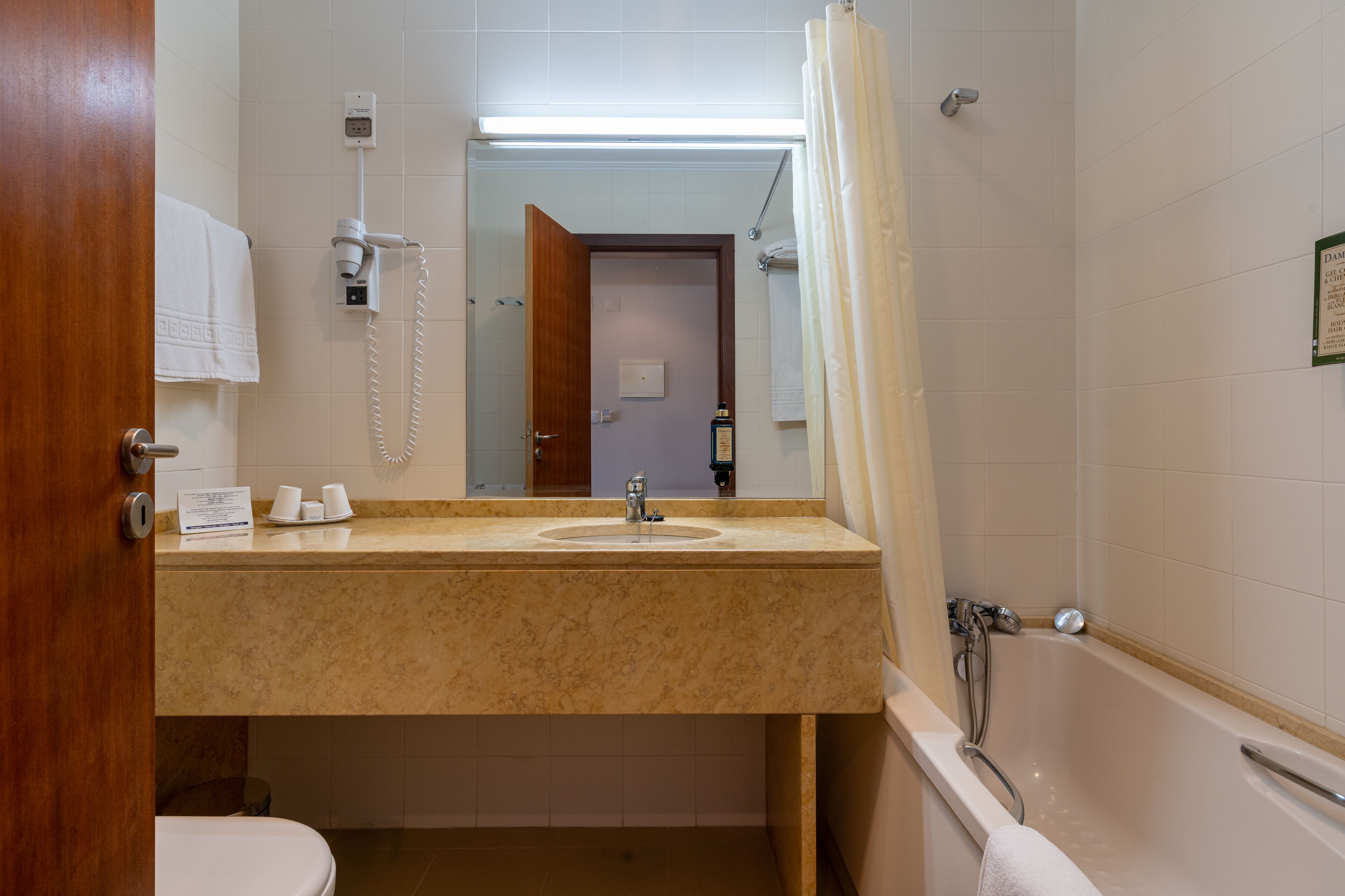 combined shower/bathtub, deep-soaking bathtub, free toiletries