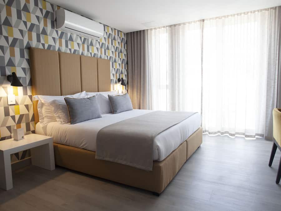 Superior Deluxe Room | Premium bedding, in-room safe, individually decorated, desk