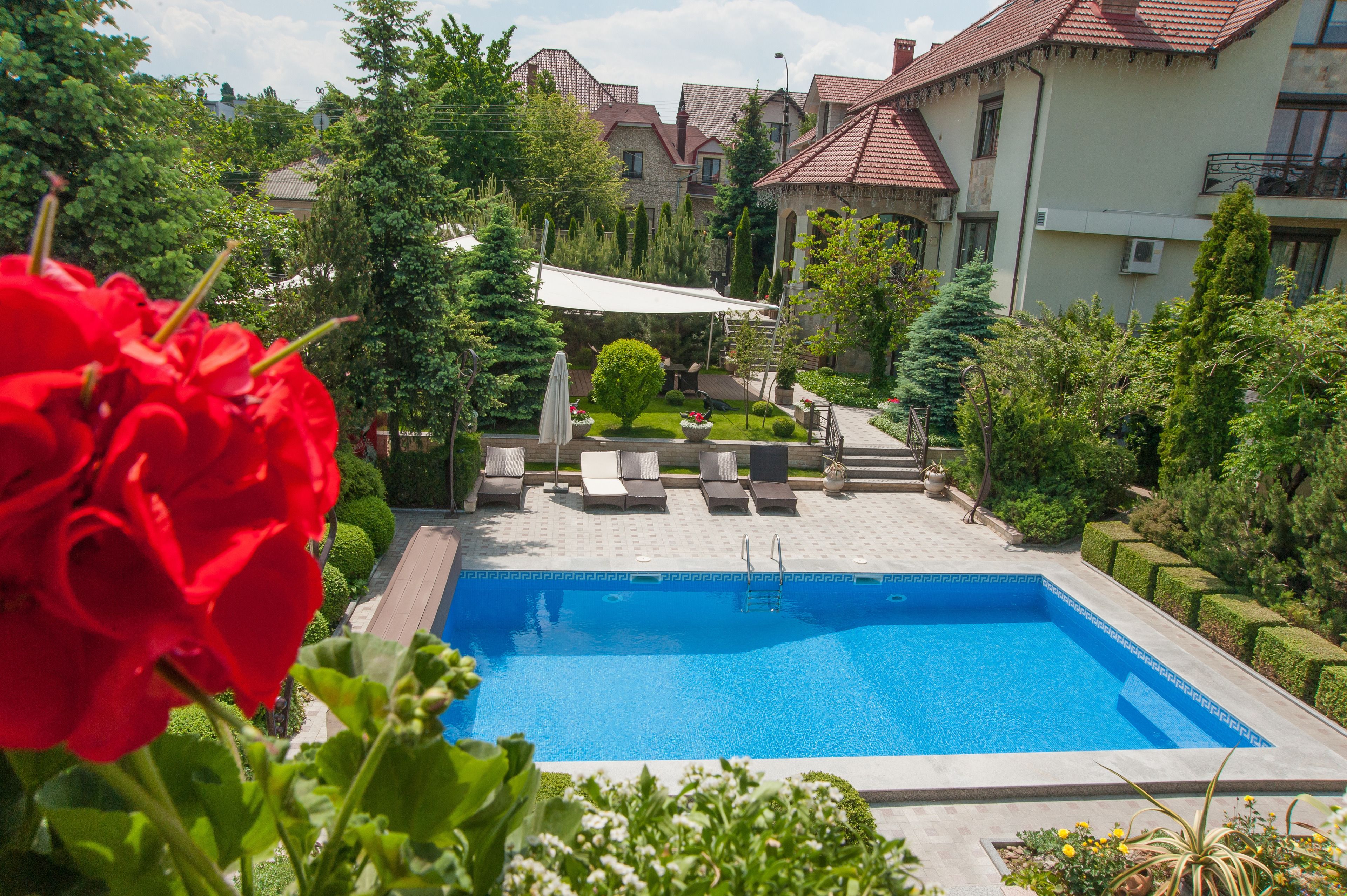 2 outdoor pools, open 8 am to 8 pm, pool loungers