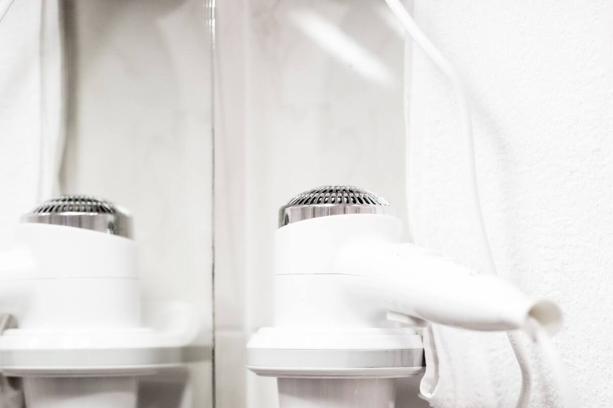 standard double or twin room | bathroom | separate bathtub and shower, hair dryer, towels