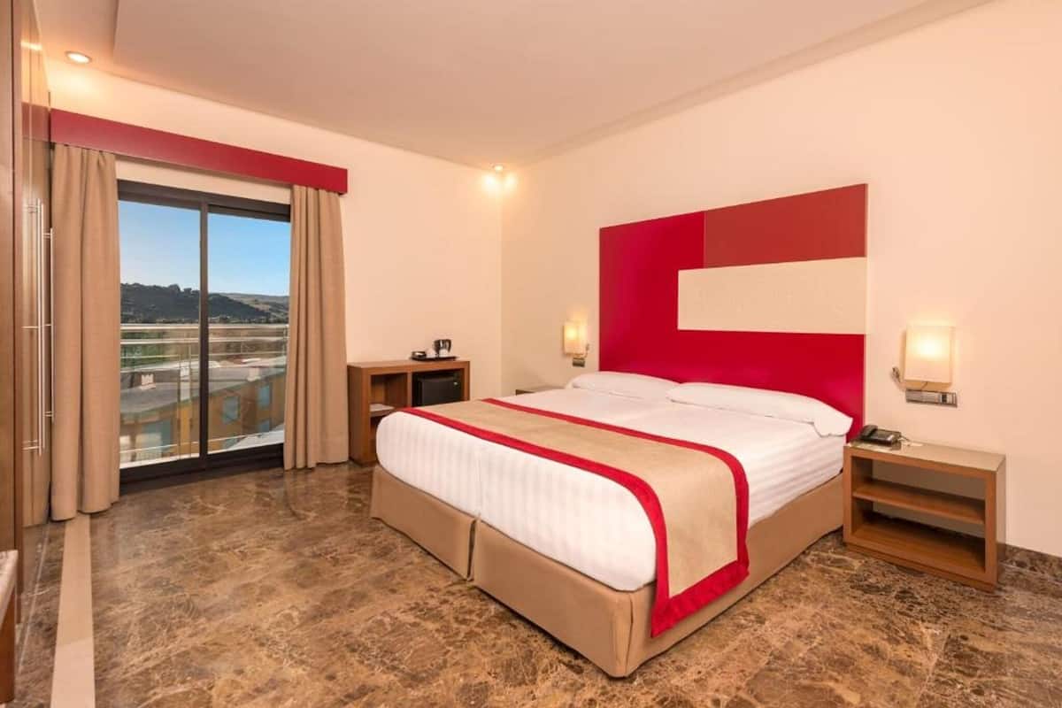 Minibar, in-room safe, blackout drapes, iron/ironing board