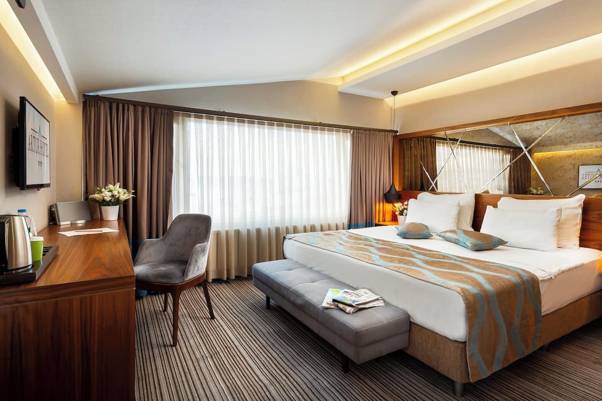 Pillow-top beds, minibar, in-room safe, desk