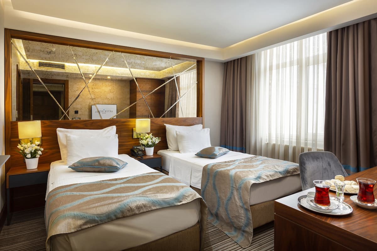 Pillow-top beds, minibar, in-room safe, desk