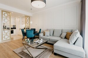 One-bedroom Deluxe Apartment for 4 people | Living area | LCD TV, DVD player - inQse Wroclaw | Centre (Wroclaw)