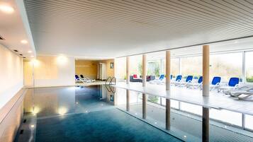 Indoor pool, open 7:00 AM to 9:30 PM, pool loungers