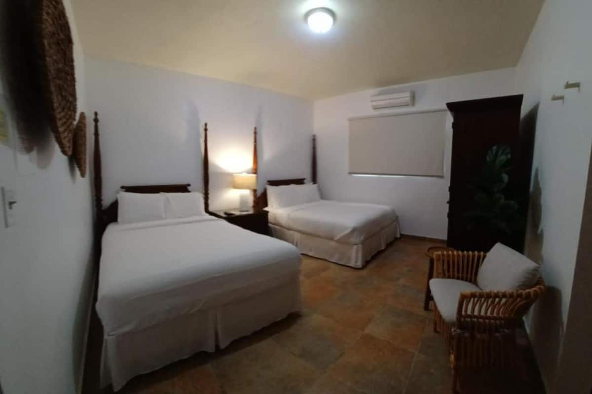 quadruple room | 1 bedroom, premium bedding, pillow-top beds, in-room safe