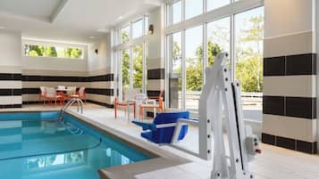 Indoor pool, open 9:00 AM to 10:00 PM, pool loungers