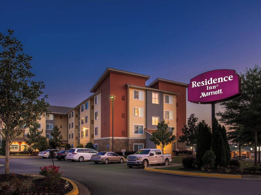 A multi-story hotel with a prominent sign for Residence Inn Marriott.