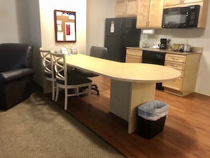 Suite, 1 Bedroom | Living room | 32-inch TV with cable channels, DVD player
