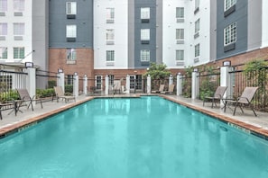 Outdoor pool, open 10 AM to 10 PM, sun loungers