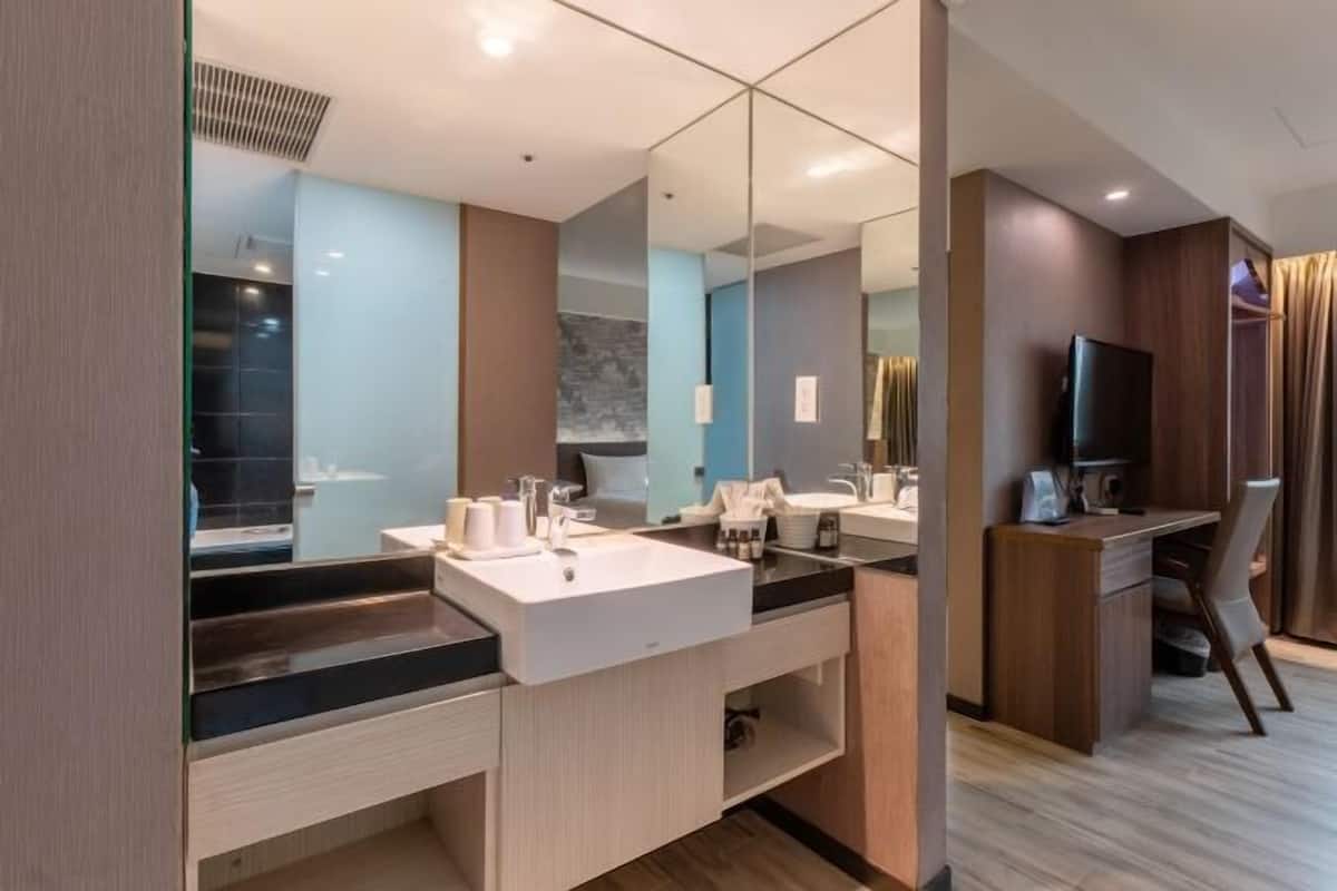 Bathroom | Shower, rainfall showerhead, hair dryer, towels