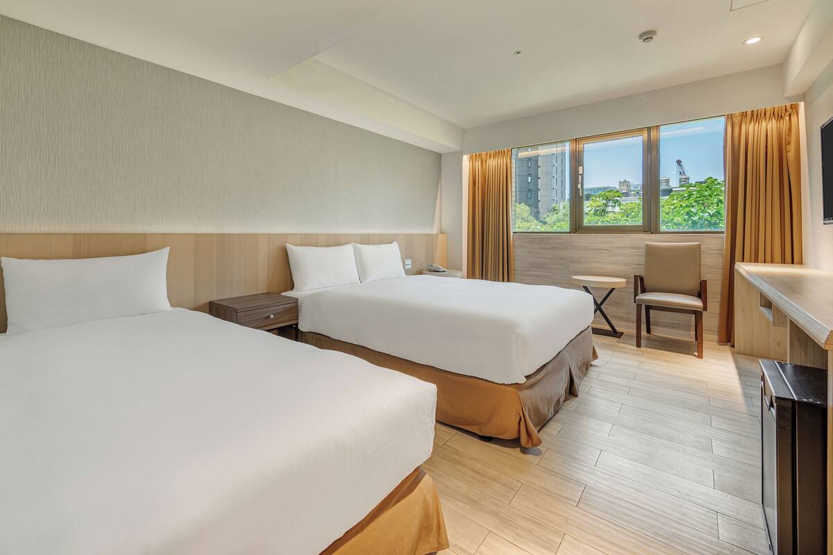 Triple Room | Down comforters, minibar, desk, blackout drapes