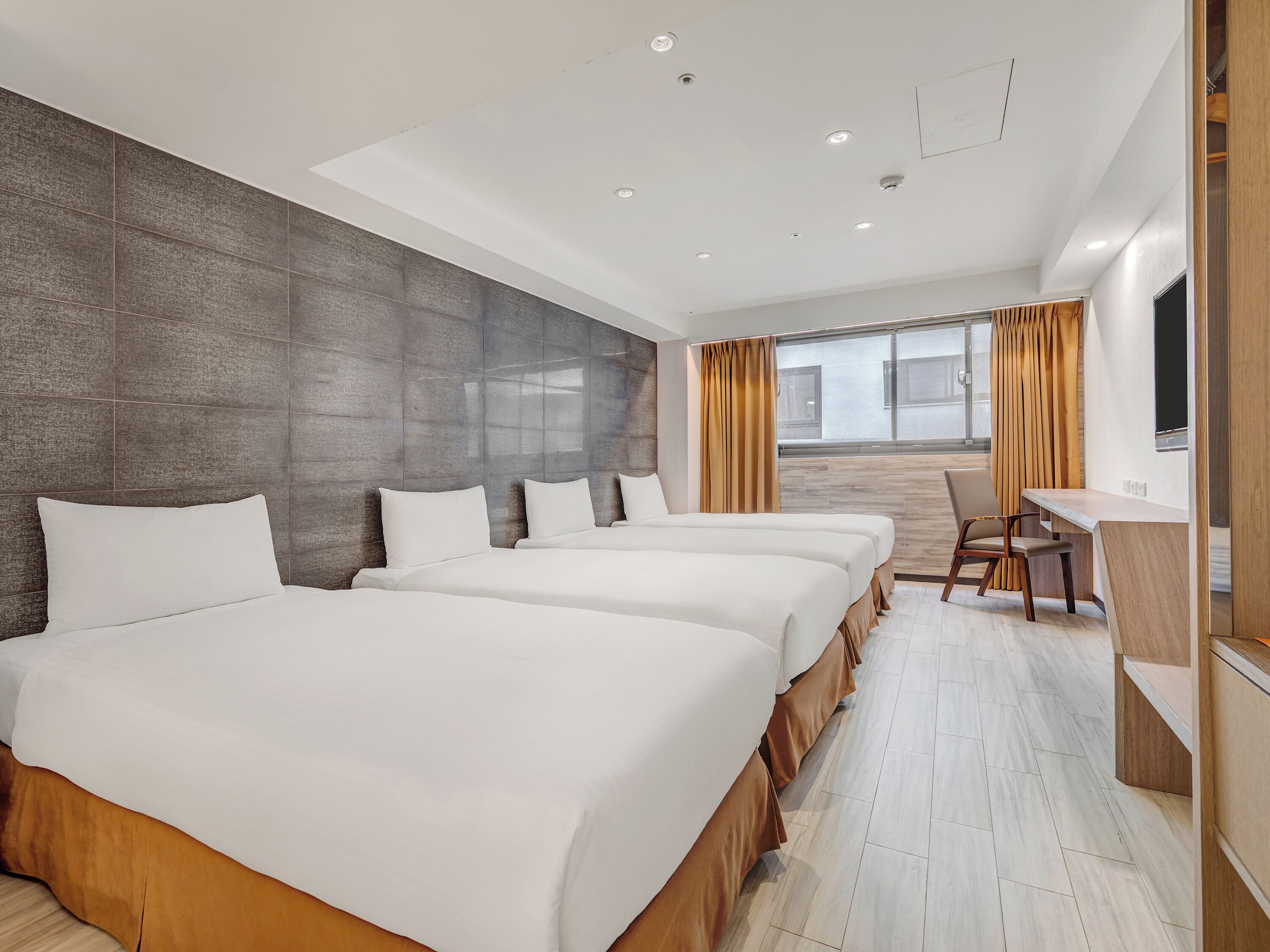 Superior Quadruple Room | Down comforters, minibar, desk, blackout drapes