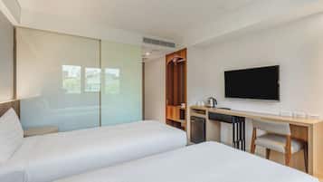 Superior Twin Room | Down comforters, minibar, desk, blackout drapes