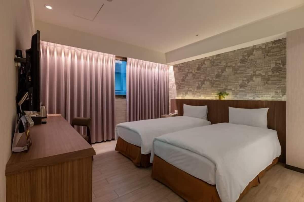 Down comforters, minibar, desk, blackout drapes