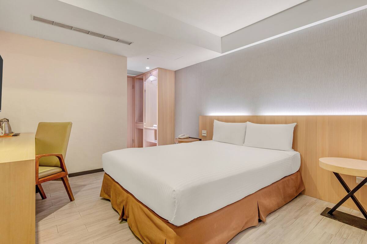 Standard Double Room, No Windows | Down comforters, minibar, desk, blackout drapes