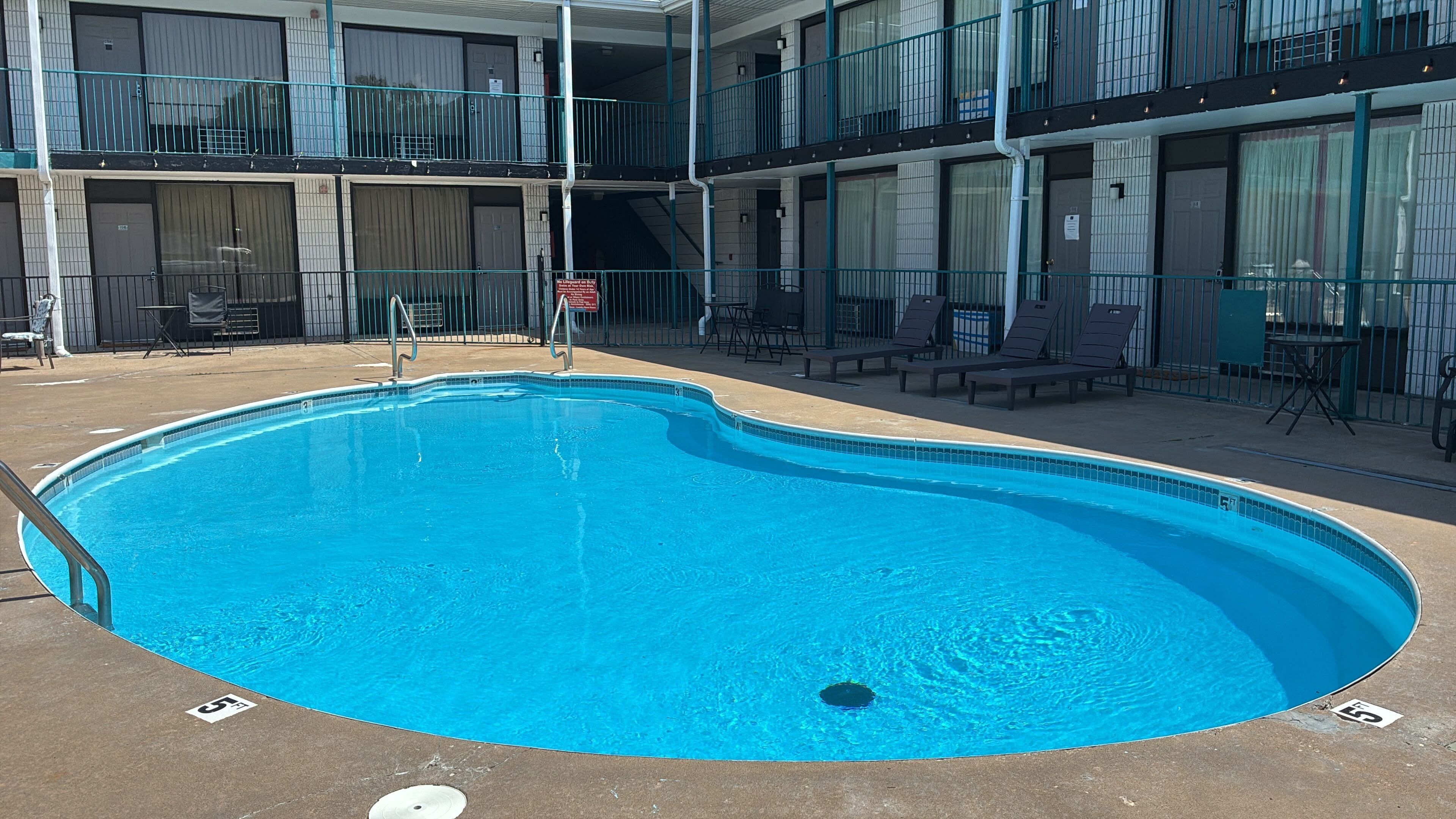 Seasonal outdoor pool, open 9:00 AM to 10:00 PM, sun loungers