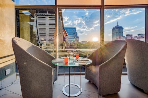 Breakfast, lunch, dinner served; international cuisine, pool views