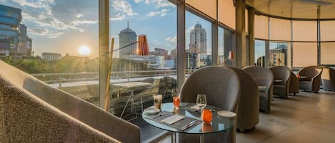 Breakfast, lunch, dinner served; international cuisine, pool views