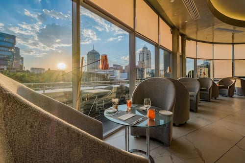 Breakfast, lunch, dinner served; international cuisine, pool views