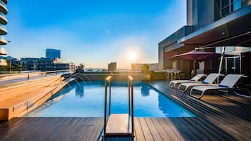 Outdoor pool, pool umbrellas, pool loungers