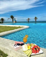 Outdoor pool, pool umbrellas, pool loungers