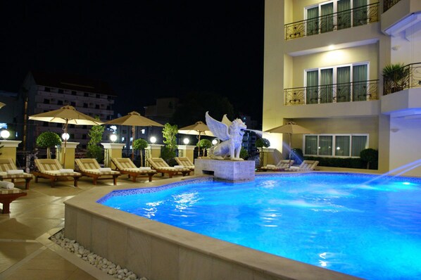 Outdoor pool, pool umbrellas, pool loungers