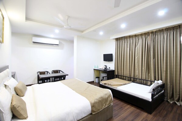 Habitación Deluxe | Sábanas de algodón egipcio y ropa de cama de alta calidad