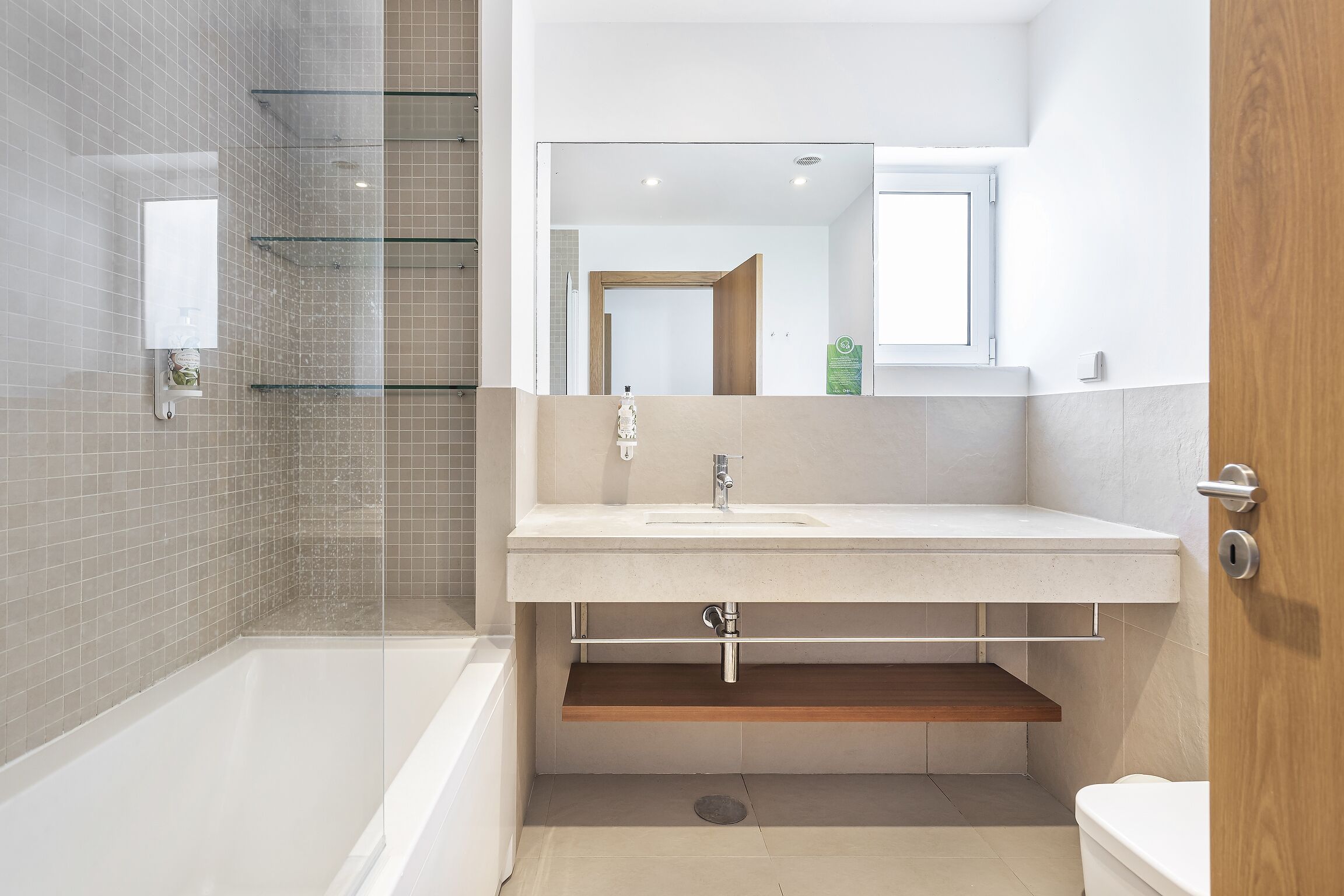 apartment, 2 bedrooms | bathroom | combined shower/bathtub, rainfall showerhead, free toiletries