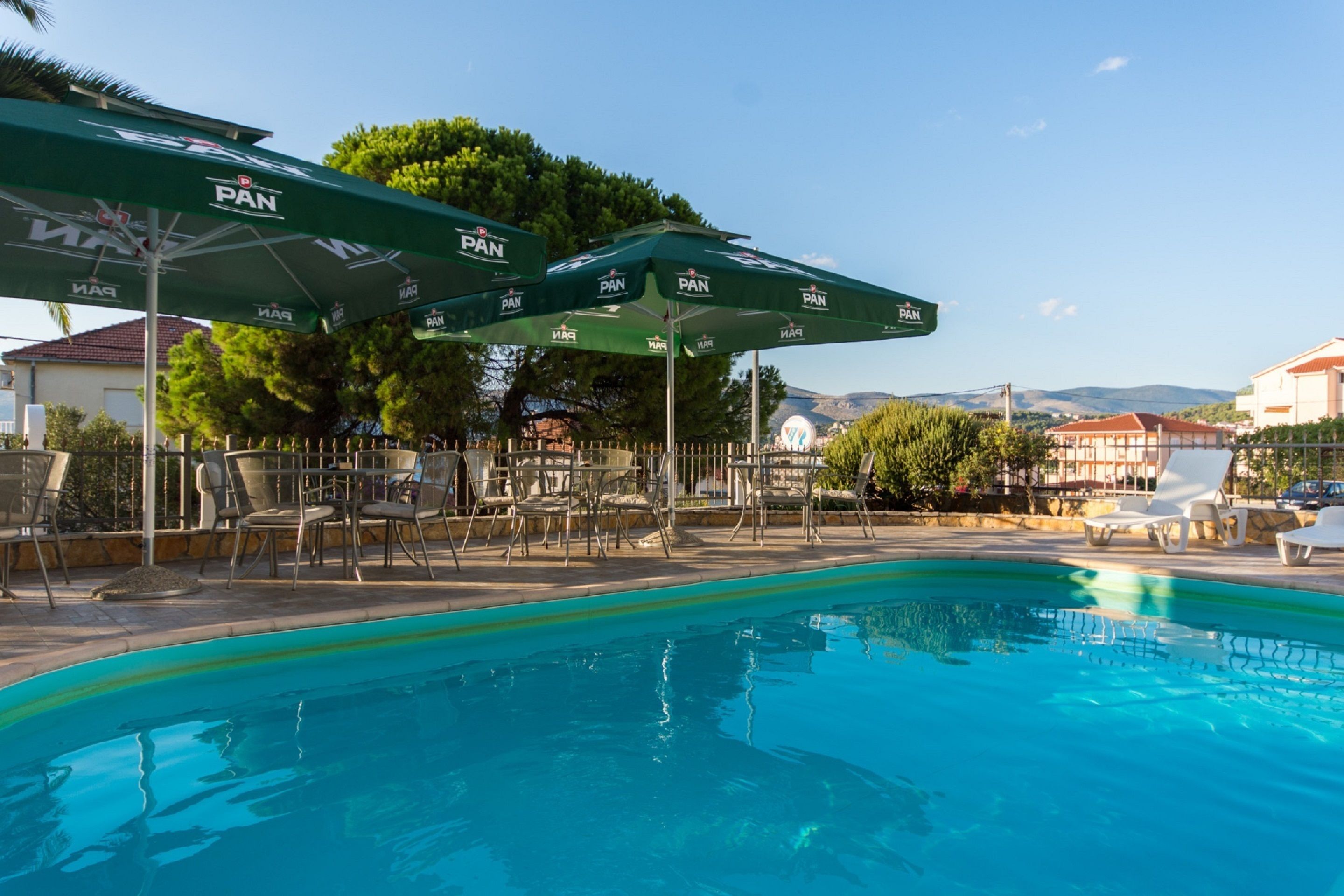 outdoor pool, pool loungers