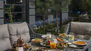 Breakfast, lunch, dinner served; garden views