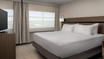 King, Suíte, 2 quartos | Cofres nos quartos, escrivaninha, ferros/tábuas de passar roupa