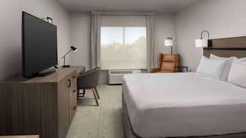 Coffres-forts dans les chambres, bureau, fer et planche à repasser