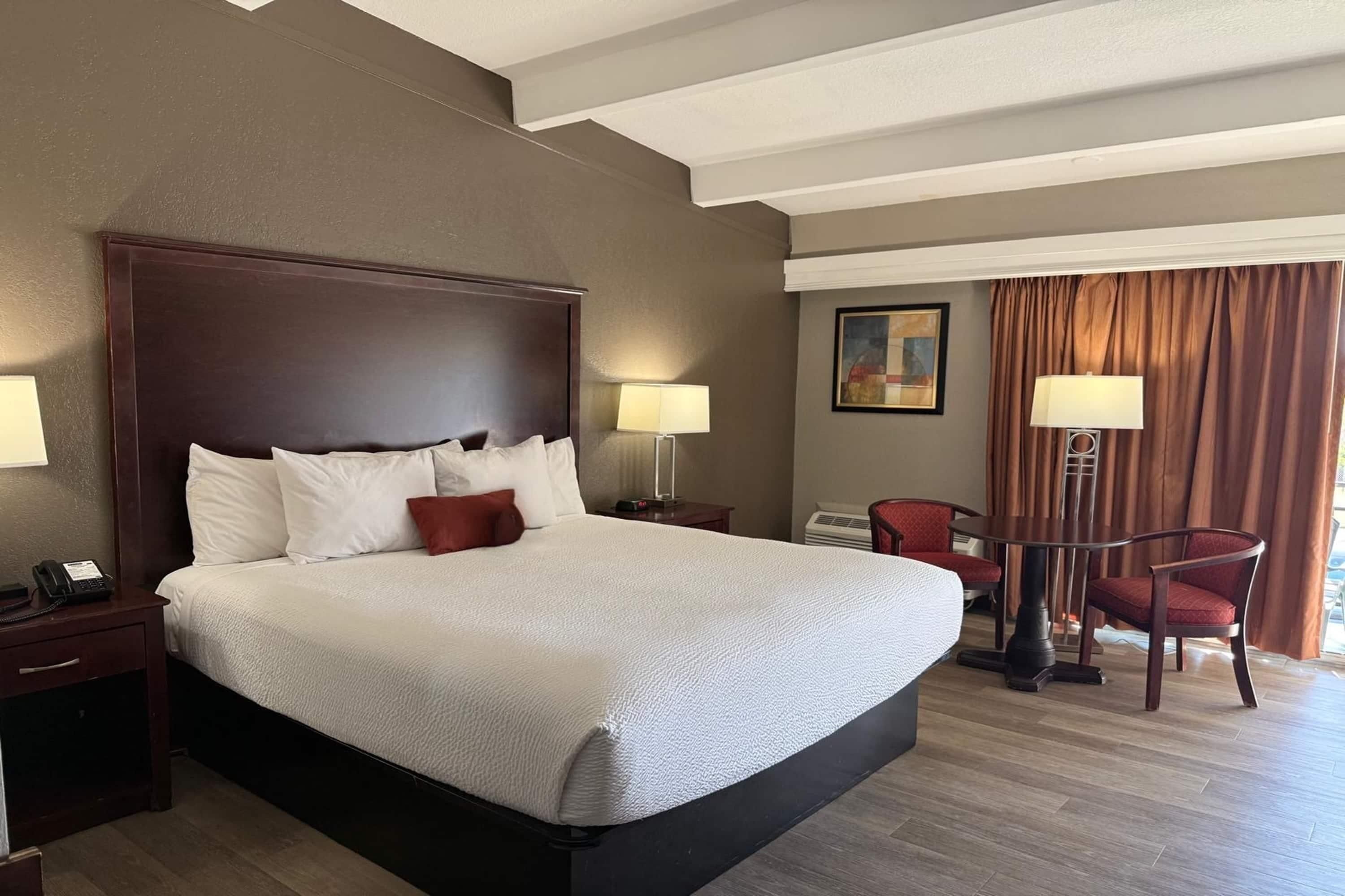 Room, 1 King Bed, Non Smoking | Iron/ironing board, free cribs/infant beds, rollaway beds, free WiFi