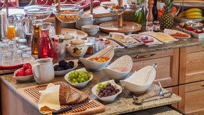 A breakfast buffet with various food items and beverages. - Hotel Talhof (Wildschonau)