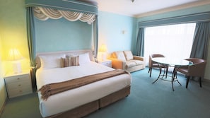 Pillow-top beds, desk, laptop workspace, blackout curtains