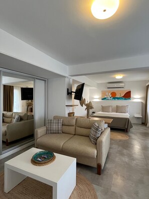 Familie studio suite | Select Comfort-bedden, een minibar, een kluis op de kamer