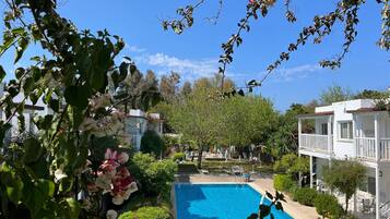 Outdoor pool, open 9:00 AM to 8:30 PM, pool umbrellas, sun loungers