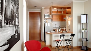 Apartamento, 1 habitación | Sala de estar | Una televisión LCD