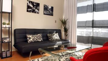 Apartment, 1 Bedroom | Living area | LCD TV