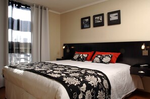 Apartment, 1 Bedroom | Pillowtop beds, in-room safe, iron/ironing board, free cribs/infant beds - Soho Santiago Apartments (Santiago)